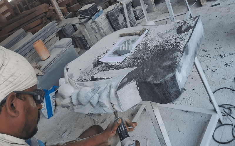 granite headstone carving
